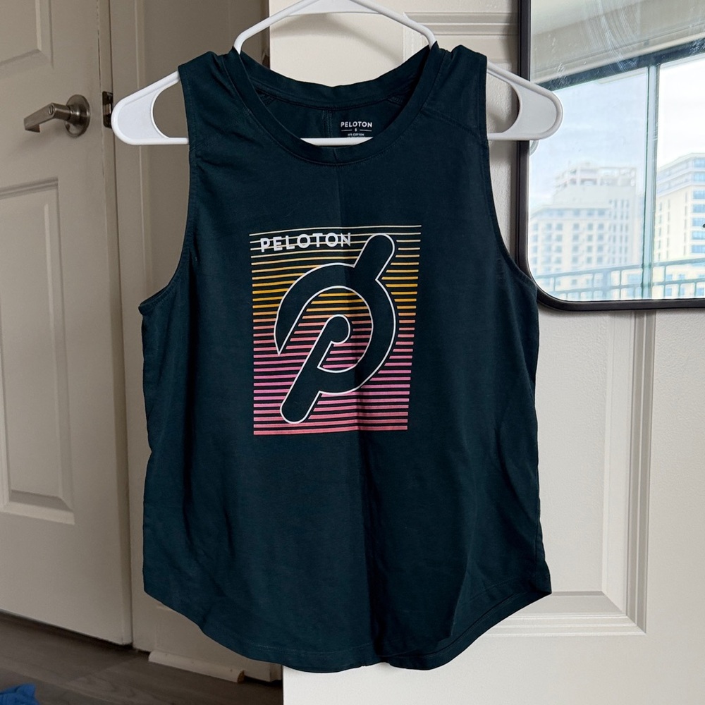 Peloton Black Tank Top with Pink and Yellow Gradient Logo
